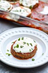 An oven-fry method creates this crispy Baked Eggplant Parmesan that rivals any fried version. An easy, updated take on the classic Italian dish.